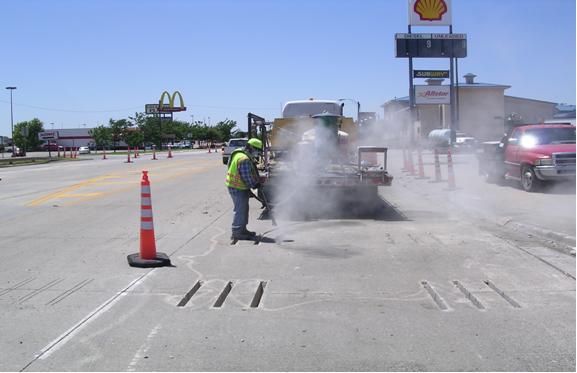 Sandblasting the slots. (click in image to see full-size image)