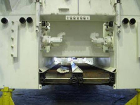 Conveyors (seen from the rear of a partiallybuilt paver).© Copyright 2006 University of Washington (click in image to see full-size image)