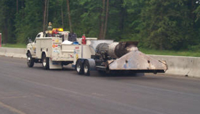 Jet dryer used ahead of the tack coat distributor.© Copyright 2006 University of Washington (click in image to see full-size image)