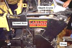 Screed close-up showing the screed armand depth crank.© Copyright 2006 University of Washington (click in image to see full-size image)