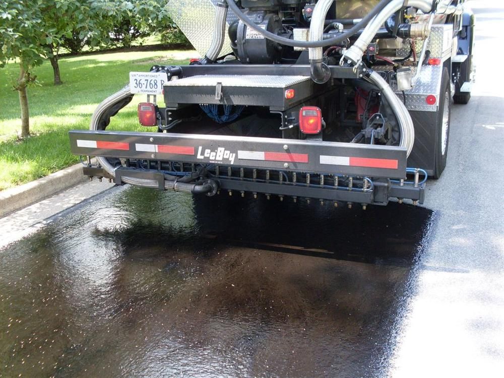 Tack Coat Distributor Truck Spray Bar.© Copyright 2006 University of Washington (click in image to see full-size image)