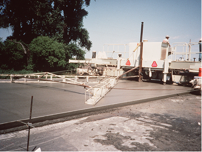 "V" shaped drag float pulled by paver. (click in image to see full-size image)