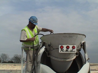 Washing the mixer drum. (click in image to see full-size image)