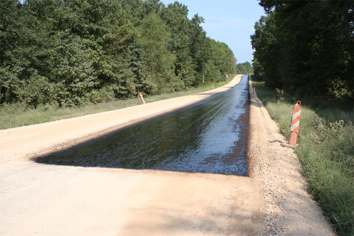 Spray-applied prime (MC-30 or AEP). (click in image to see full-size image)
