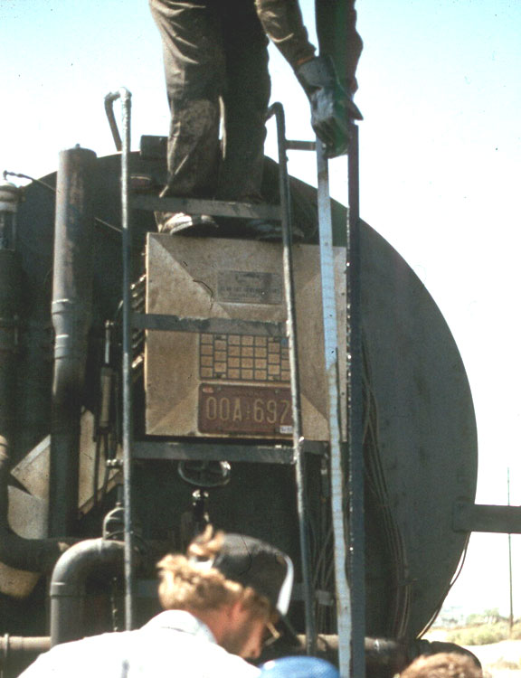 Strap Stick Used to Measure Quantity ofAsphalt in Distributor Tank. (click in image to see full-size image)