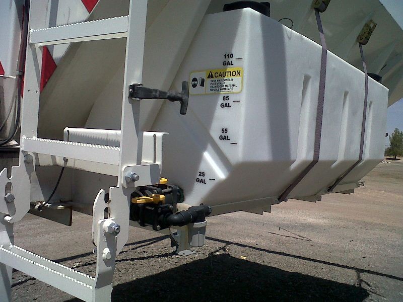 A saddle tank is a useful means of pre-wettingsolid chemicals. (click in image to see full-size image)
