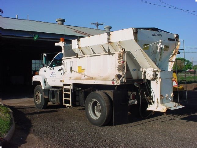 Tail gate spreaders are used to apply de-icingand anti-icing materials. They are a spinner type applicator andoperate via a hydraulic system. (click in image to see full-size image)