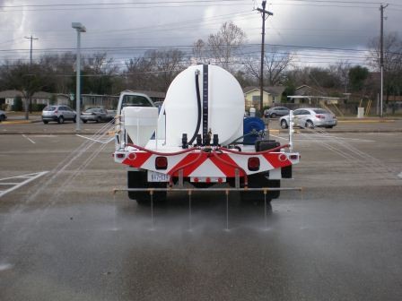 The herbicide rig is used to apply anti-icingliquids prior to an approaching storm. It is also used for de-icingapplications during the storm. (click in image to see full-size image)
