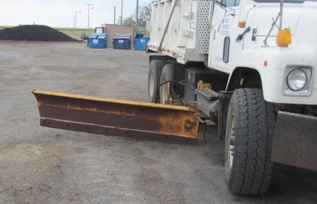 The snow wing attachment provides extrawidth on a motor grader or truck for plowing two lanes at a timeor picking up a lane and a shoulder at the same time. (click in image to see full-size image)