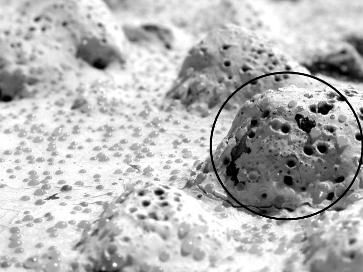 Poor bead retention on top of aggregates. (click in image to see full-size image)