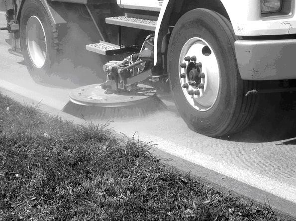 Typical brooming operation for surface cleaning prior to striping. (click in image to see full-size image)