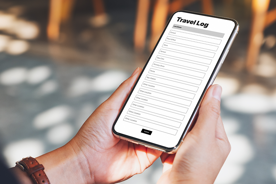 Person viewing travel log on phone